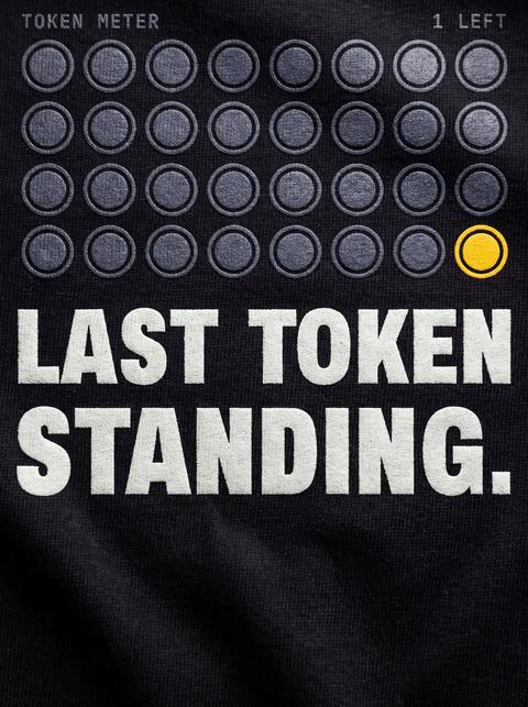 The print, up close, Black. Fitted mockup. Printed: TOKEN METER / 1 LEFT / LAST TOKEN / STANDING.