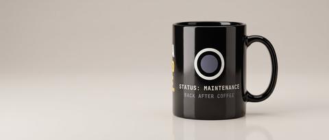 Scheduled Outage mug in Black. Fitted mockup. Printed on the wrap: SLEEP IS A / SCHEDULED / OUTAGE. / STATUS: MAINTENANCE / BACK AFTER COFFEE.